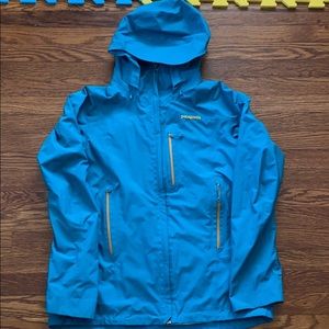 Teal & Yellow Patagonia ski jacket